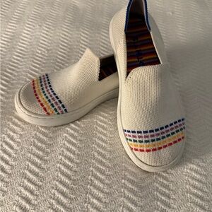 Rothy’s White Slip-On Shoes with Rainbow Stripes